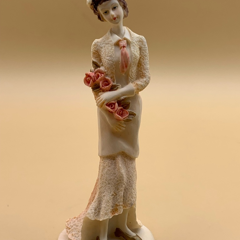 Elegant Porcelain Figurine with Pink Roses